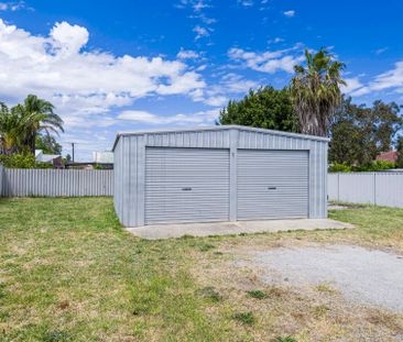 Neat & Tidy Home with Workshop and Side Access - Photo 1