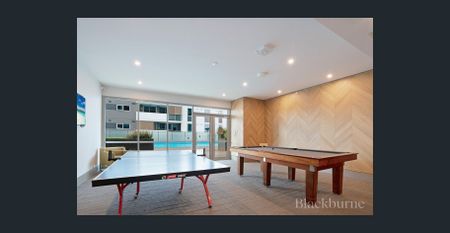 EXECUTIVE APARTMENT LIVING AT ITS FINEST - Photo 3