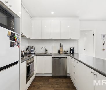Furnished city retreat with lifestyle amenities in prime location - Photo 6