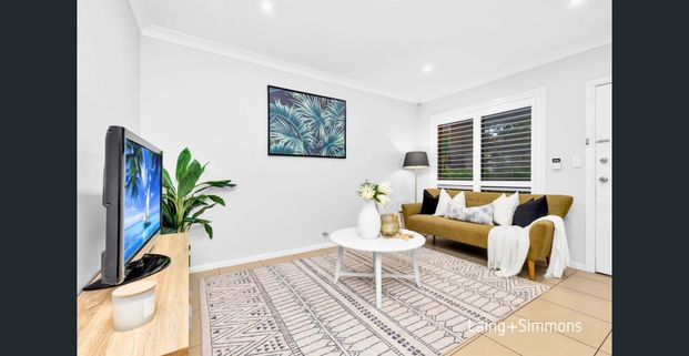 Modern townhouse with multiple living spaces - Photo 1