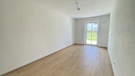 Neubauwohnung mit Garten und hervorragender Anbindung zur A94 - Photo 2