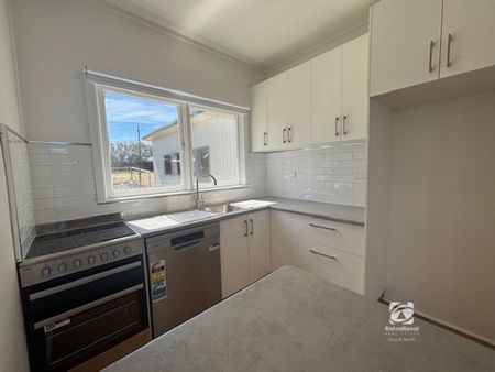 FRESHLY RENOVATED ON THE LAKES EDGE! - Photo 4