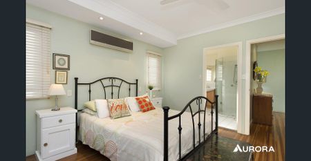Stunning Elevated Queenslander with City Views & Exceptional Family Living - Photo 4