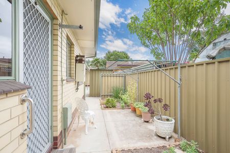 Neat As a Pin ! Two Bedroom Unit in Great Location! - Photo 2