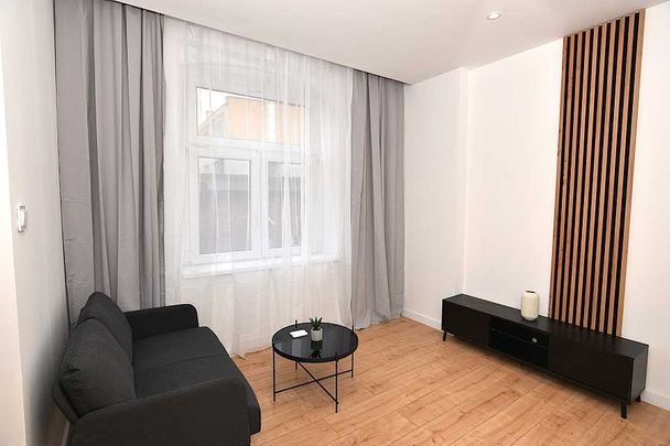 Nowocześnie odnowiona kawalerka w Centrum - Photo 1