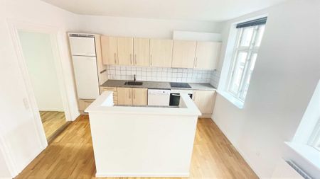 Stor 2-værelses lejlighed ved gågaden - Photo 3