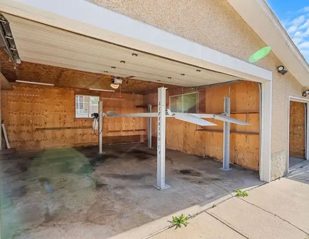 Oversized Double Garage with four post Hoist Car Lift- Mechanics Dream Workshop | Calgary - Photo 1