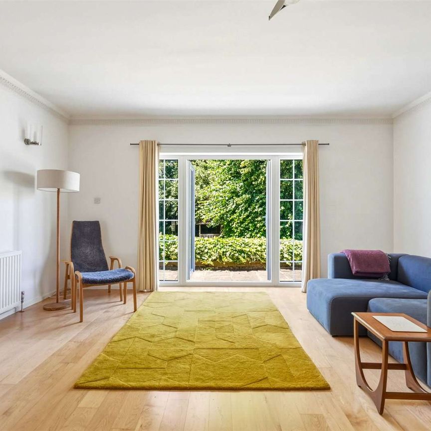 A modern detached four bedroom family home, situated on a highly sought-after road within Loughton - Photo 1