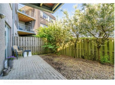 Knus gelijkvloers appartement met leuk zonneterras en tuintje - Photo 5