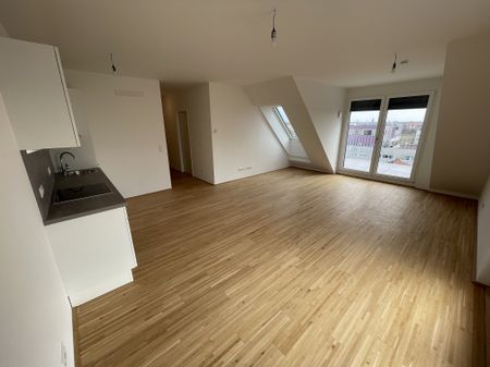 Zwei Dachterrassen, Kühlung & 2 Monate mietfrei: attraktive 3-Zimmer-DG-Wohnung - Foto 3