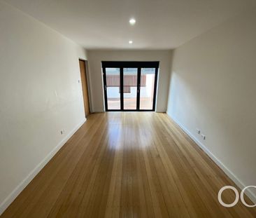 Open the Door to Comfort, Convenience and Courtyard Charm - Photo 6