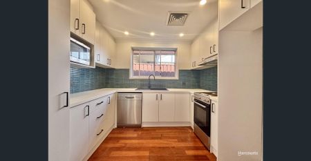 Freshly Painted Family Home with Modern Comforts... - Photo 5