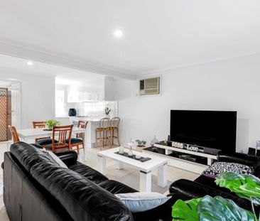 Fully-Renovated, Stylish Two Bedroom Townhouse in a Prime Location! - Photo 6