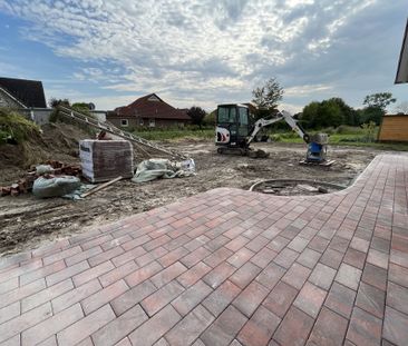 Neubauwohnung im Erdgeschoss mit großer Garage und Garten - Foto 4