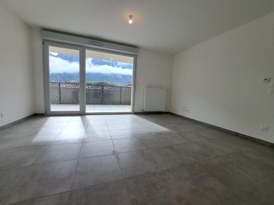 Location Appartement 2 pièces 46m² SCIONZIER 74950 - Photo 1