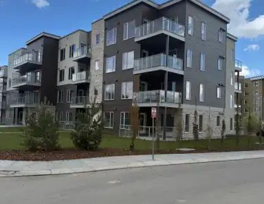 2 Bed + Den | 2 Bath | 1 Parking | 700 Shawnee Court Southwest, Calgary - Photo 1
