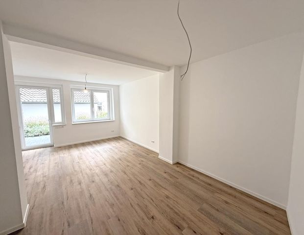 Erstbezug nach aufwendiger Sanierung – Wohnen mit Terrasse - Foto 1