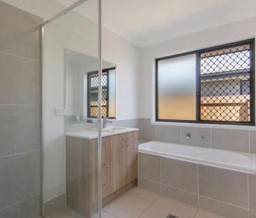 A modern sanctuary in a peaceful, family-friendly pocket, this beau... - Photo 1