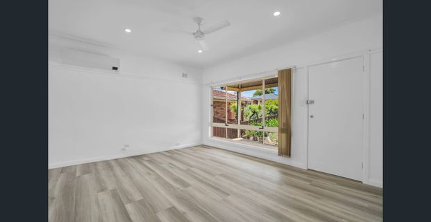 Updated three-bedroom home - Photo 1