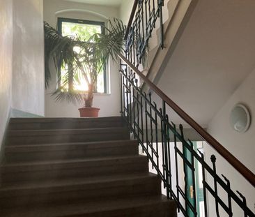 Tolle Dachgeschosswohnung mit großem Balkon - Foto 4