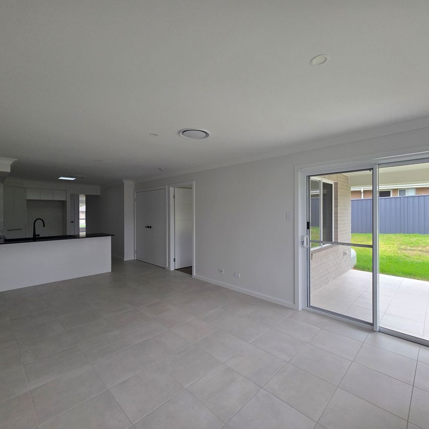 Brand New 3-Bedroom Duplex in Sought-After Taree Estate - Photo 1