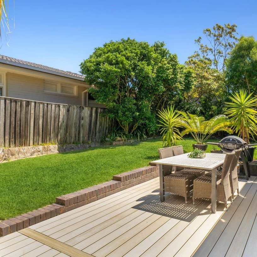 LIGHT-FILLED FAMILY RETREAT OFFERING SPACE AND CONVENIENCE - Photo 1