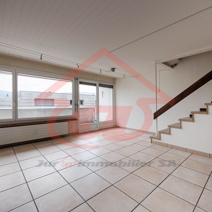 Maison en rangée de 4 pièces sur les hauts de Delémont - Photo 1