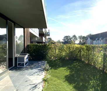 PERFECT INSTAPKLAAR GELIJKVLOERS APPARTEMENT MET TUIN! - Photo 6