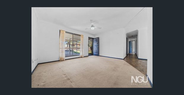 Well-Zoned 4 Bedroom Home - Photo 1