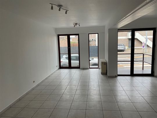 gelijkvloers flat met klein terras aan voorkant. - Foto 1