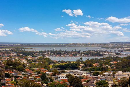 Near New 1 bedroom apartment plus sunny room with stunning views, in the heart of Hurstville for lease - Photo 2