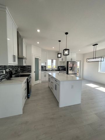 Brand New 4 Bedroom Upper Unit in Aspen Ridge - Photo 3