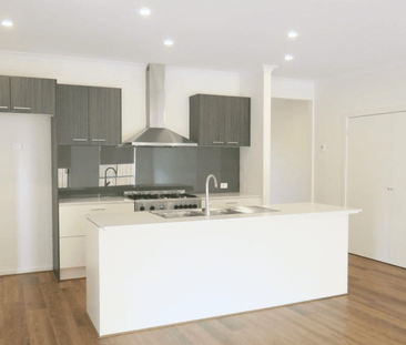 Modern Family Living in a Convenient Aintree Location - Photo 4