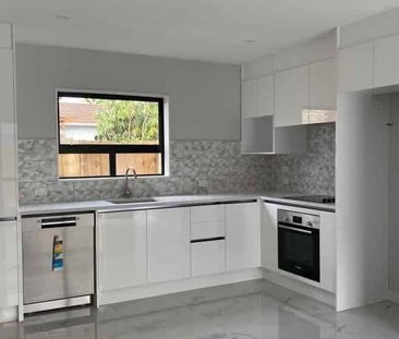 Elegant Four-Bedroom Home in a Convenient Location - Photo 1