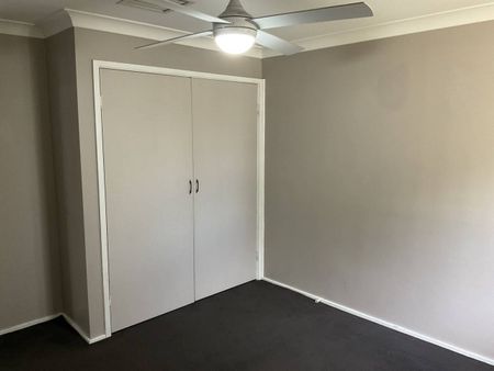 NEAT AND TIDY THREE BEDROOM HOME - Photo 5
