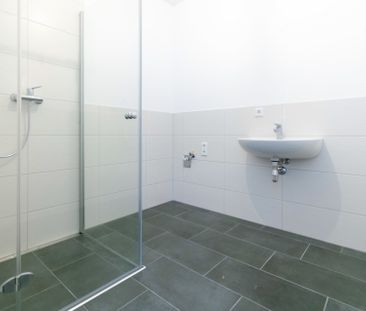 Schöne 2-Zimmer Neubauwohnung mit Tiefgaragenparkplatz und Küche! - Foto 1