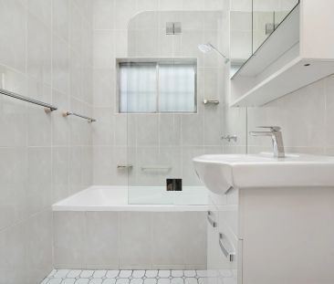 REJUVENATED AIR-CONDITIONED FAMILY HOME IN SOUGHT AFTER STREET - Photo 4