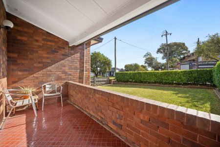 Spacious Full-Brick Home with Large Garage and Prime Punchbowl Location - Photo 5