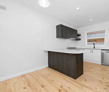 Modern, Fully Renovated Unit in a Convenient Location - Photo 1