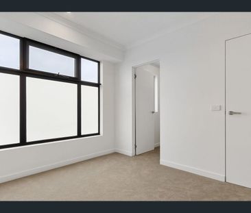 Stylish Three-Storey Living with Modern Comforts - Photo 3