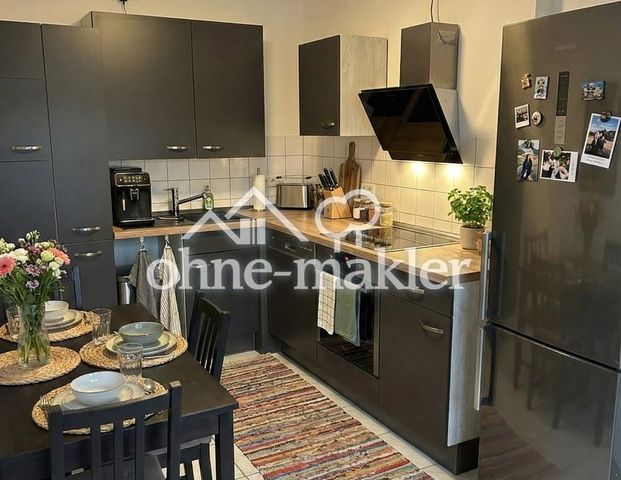 Helle Dachgeschosswohnung in bester Lage von Neuss inklusive Küche - Photo 1