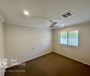 Modern 4-Bedroom Home with Multiple Living Areas - Photo 6