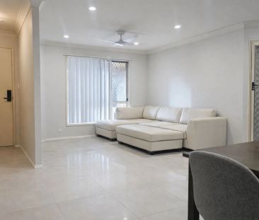 Spacious 4-Bedroom Family Home with Air-Conditioning Throughout - Photo 1