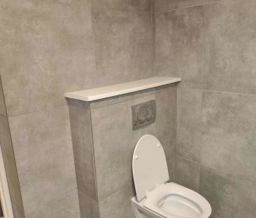 Lyst rækkehus med moderne indretning og dejlig have - Photo 2