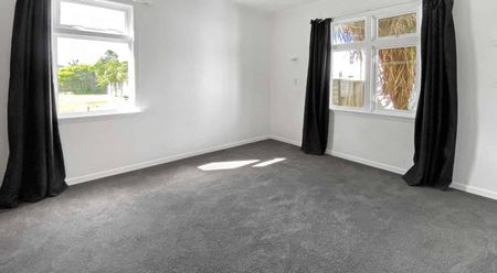 Spacious Three-Bedroom Home with Large Secure Backyard - Photo 4