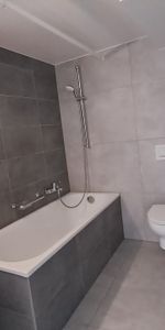Appartement 2,5 pièces dans immeuble récemment rénové - Photo 4