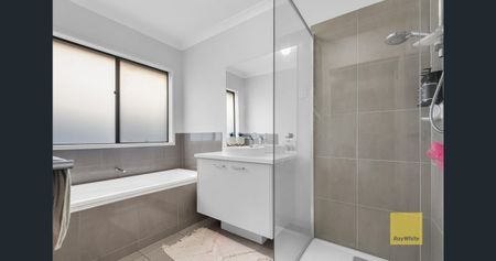 Charming 3-Bedroom Home with Modern Comforts and Single Garage - Photo 4