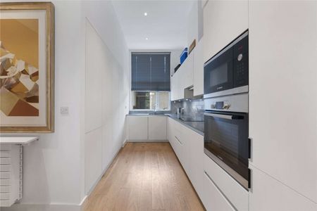 SINGLE HOUSEHOLD ONLY. The property comprises of an open plan kitchen and reception room, master bedroom with en-suite and access to a private balcony. - Photo 4