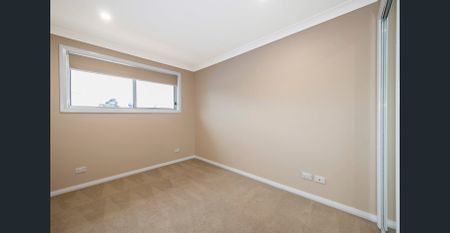 Spacious 4-Bedroom home in Prime Location! - Photo 4