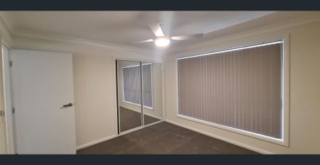 Conveniently Located Family Home - Close to Shops, Town & Beach - Photo 2